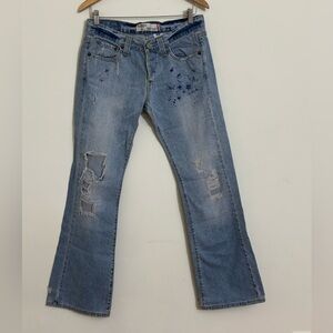 Levi’s 513 || Woman’s slouch Bootcut distressed blue jeans size 7